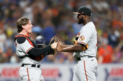 Jul 20, 2023; St. Petersburg, Florida, USA;  Baltimore Orioles catcher Adley Rutschman (35) and relief pitcher Felix Bautista (74) celebrate after beating the Tampa Bay Rays in eleventh innings at Tropicana Field. Mandatory Credit: Nathan Ray Seebeck-USA TODAY Sports