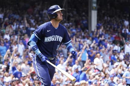 Jul 21, 2023; Chicago, Illinois, USA; Chicago Cubs first baseman Cody Bellinger (24) hits a two-run home run against the St. Louis Cardinals during the third inning at Wrigley Field. Mandatory Credit: David Banks-USA TODAY Sports
