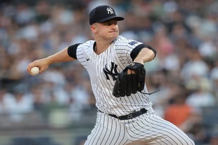 Jul 21, 2023; Bronx, New York, USA; New York Yankees starting pitcher Clarke Schmidt (36) pitches against the Kansas City Royals during the first inning at Yankee Stadium. Mandatory Credit: Brad Penner-USA TODAY Sports