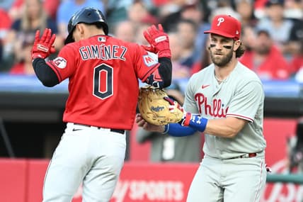 Jul 21, 2023; Cleveland, Ohio, USA; Philadelphia Phillies first baseman Bryce Harper (3) tags out Cleveland Guardians second baseman Andres Gimenez (0) during the fourth inning at Progressive Field. Mandatory Credit: Ken Blaze-USA TODAY Sports