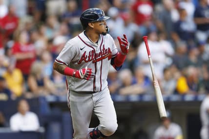 Jul 21, 2023; Milwaukee, Wisconsin, USA;  Atlanta Braves shortstop Orlando Arcia (11) flips his bat after hitting a home run during the second inning against the Milwaukee Brewers at American Family Field. Mandatory Credit: Jeff Hanisch-USA TODAY Sports