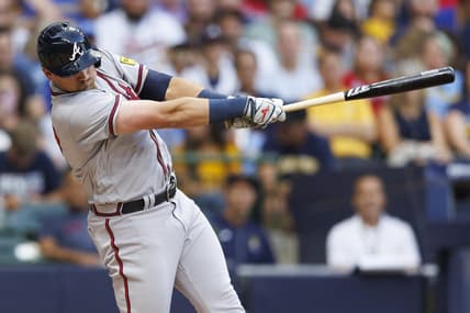 Jul 21, 2023; Milwaukee, Wisconsin, USA;  Atlanta Braves third baseman Austin Riley (27) hits a home run during the third inning against the Milwaukee Brewers at American Family Field. Mandatory Credit: Jeff Hanisch-USA TODAY Sports
