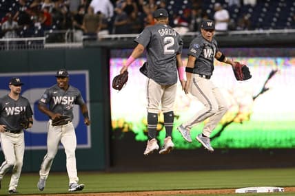 Jul 21, 2023; Washington, District of Columbia, USA; Washington Nationals center fielder Alex Call (17) celebrates with second baseman Luis Garcia (2) after the game against the San Francisco Giants at Nationals Park. Mandatory Credit: Brad Mills-USA TODAY Sports