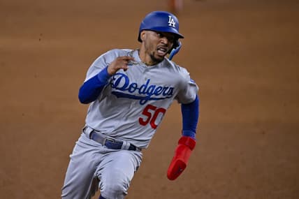 Jul 21, 2023; Arlington, Texas, USA; Los Angeles Dodgers right fielder Mookie Betts (50) scores against the Texas Rangers during the eighth inning at Globe Life Field. Mandatory Credit: Jerome Miron-USA TODAY Sports