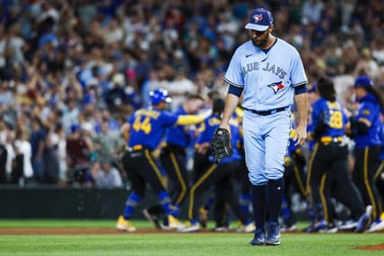 Jul 21, 2023; Seattle, Washington, USA; Toronto Blue Jays first baseman Brandon Belt (13) walks back to the dugout following a 3-2 loss to the Seattle Mariners during the ninth inning at T-Mobile Park. Mandatory Credit: Joe Nicholson-USA TODAY Sports
