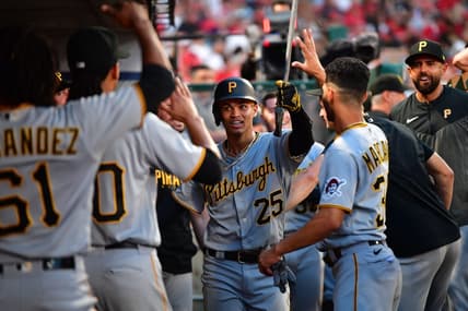 Jul 22, 2023; Anaheim, California, USA; Pittsburgh Pirates catcher Endy Rodriguez (25) celebrates after hitting a solo home run against the Los Angeles Angels during the sixth inning at Angel Stadium. Mandatory Credit: Gary A. Vasquez-USA TODAY Sports