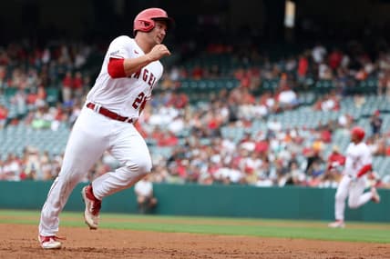 Jul 23, 2023; Anaheim, California, USA;  Los Angeles Angels catcher Matt Thaiss (21) runs to a third on RBI double by first baseman Eduardo Escobar (5) during the second inning against the Pittsburgh Pirates at Angel Stadium. Mandatory Credit: Kiyoshi Mio-USA TODAY Sports