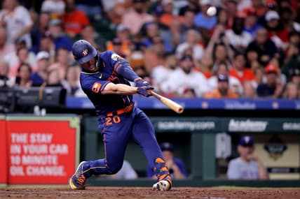 Jul 24, 2023; Houston, Texas, USA; Houston Astros left fielder Chas McCormick (20) hits a sacrifice fly for an out against the Texas Rangers during the fifth inning Minute Maid Park. Mandatory Credit: Erik Williams-USA TODAY Sports