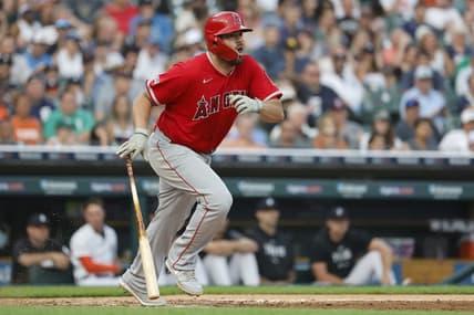 Jul 25, 2023; Detroit, Michigan, USA;  Los Angeles Angels first baseman Mike Moustakas (8) hits a single in the fifth inning against the Detroit Tigers at Comerica Park. Mandatory Credit: Rick Osentoski-USA TODAY Sports