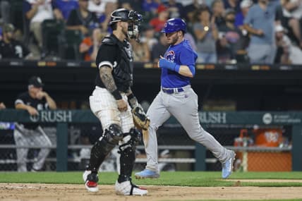 Jul 25, 2023; Chicago, Illinois, USA; Chicago Cubs left fielder Ian Happ (8) scores against the Chicago White Sox during the seventh inning at Guaranteed Rate Field. Mandatory Credit: Kamil Krzaczynski-USA TODAY Sports
