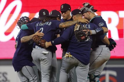 Jul 25, 2023; Minneapolis, Minnesota, USA; The Seattle Mariners celebrate their win over the Minnesota Twins at Target Field. Mandatory Credit: Bruce Kluckhohn-USA TODAY Sports