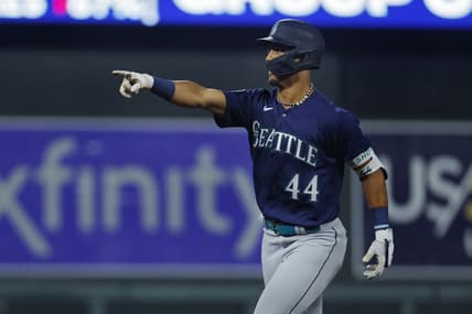 Jul 25, 2023; Minneapolis, Minnesota, USA; Seattle Mariners center fielder Julio Rodriguez (44) celebrates his two-run home run against the Minnesota Twins in the eighth inning at Target Field. Mandatory Credit: Bruce Kluckhohn-USA TODAY Sports