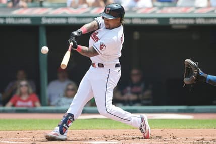 Jul 26, 2023; Cleveland, Ohio, USA; Cleveland Guardians designated hitter Jose Ramirez (11) hits a home run during the first inning against the Kansas City Royals at Progressive Field. Mandatory Credit: Ken Blaze-USA TODAY Sports