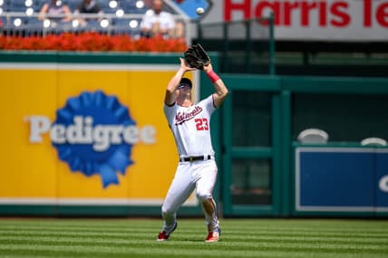 Jul 26, 2023; Washington, District of Columbia, USA; Washington Nationals left fielder Corey Dickerson (23) catches a fly ball during the sixth inning against the Colorado Rockies at Nationals Park. Mandatory Credit: Reggie Hildred-USA TODAY Sports