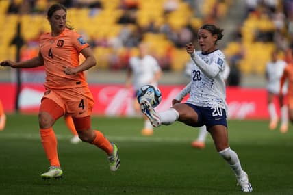 Jul 27, 2023; Wellington, NZL; United States forward Trinity Rodman (20) kicks the ball past Netherlands defender Aniek Nouwen (4) during the second half in a group stage match for the 2023 FIFA Women's World Cup at Wellington Regional Stadium. Mandatory Credit: Jenna Watson-USA TODAY Sports