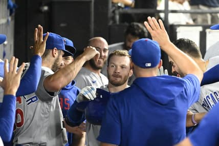 Jul 26, 2023; Chicago, Illinois, USA;  Chicago Cubs left fielder Ian Happ (8), center, celebrates in the dugout after hitting a home run against the Chicago White Sox during the eighth inning at Guaranteed Rate Field. Mandatory Credit: Matt Marton-USA TODAY Sports