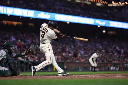 Jul 26, 2023; San Francisco, California, USA; San Francisco Giants left fielder Austin Slater (13) hits a two-run home run during the sixth inning against the Oakland Athletics at Oracle Park. Mandatory Credit: Sergio Estrada-USA TODAY Sports