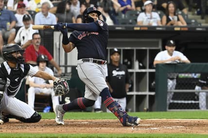 Jul 27, 2023; Chicago, Illinois, USA; Cleveland Guardians first baseman Josh Naylor (22) hits a two-RBI double against the Chicago White Sox during the third inning at  Guaranteed Rate Field. Mandatory Credit: Matt Marton-USA TODAY Sports