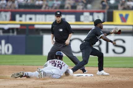 Jul 28, 2023; Chicago, Illinois, USA; Cleveland Guardians right fielder Oscar Gonzalez (39) steals second base against Chicago White Sox shortstop Tim Anderson (7) during the fifth inning at Guaranteed Rate Field. Mandatory Credit: Kamil Krzaczynski-USA TODAY Sports