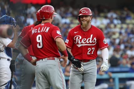 Jul 28, 2023; Los Angeles, California, USA; Cincinnati Reds right fielder Jake Fraley (27) is greeted by shortstop Matt McLain (9) after hitting a home run during the first inning against the Los Angeles Dodgers at Dodger Stadium. Mandatory Credit: Kiyoshi Mio-USA TODAY Sports