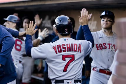 Jul 29, 2023; San Francisco, California, USA;  Boston Red Sox left fielder Masataka Yoshida (7) celebrates in the dugout after scoring against the San Francisco Giants during the ninth inning at Oracle Park. Mandatory Credit: John Hefti-USA TODAY Sports