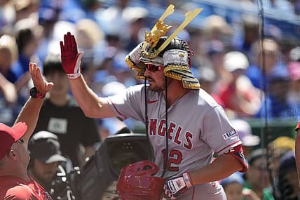 Jul 30, 2023; Toronto, Ontario, CAN; Los Angeles Angels right fielder Hunter Renfroe (12) celebrates with teammates after hitting a two run home run against the Toronto Blue Jays during the tenth inning at Rogers Centre. Mandatory Credit: John E. Sokolowski-USA TODAY Sports