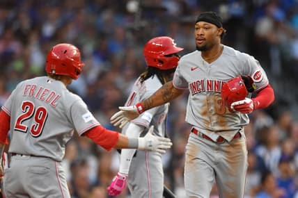 Jul 31, 2023; Chicago, Illinois, USA; Cincinnati Reds left fielder Will Benson (30) celebrates after scoring during the second inning against the Chicago Cubs at Wrigley Field. Mandatory Credit: Patrick Gorski-USA TODAY Sports