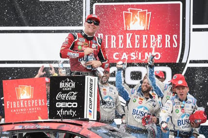 Aug 7, 2022; Brooklyn, Michigan, USA; NASCAR Cup Series driver Kevin Harvick (4) celebrates after winning at Michigan International Speedway. Mandatory Credit: Tim Fuller-USA TODAY Sports