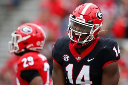 Georgia's Arik Gilbert (14) celebrates after making a touchdown catch during the G-Day spring game in Athens, Ga., on Saturday, April 16, 2022.

News Joshua L Jones

Syndication Online Athens