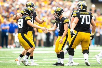 Iowa placekicker Aaron Blom (1) celebrates with longsnapper Luke Elkin, left, and holder Tory Taylor during a NCAA football game against South Dakota State, Saturday, Sept. 3, 2022, at Kinnick Stadium in Iowa City, Iowa.

220903 Sdsu Iowa Fb 020 Jpg