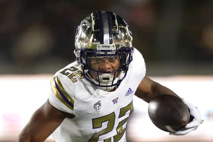 Oct 22, 2022; Berkeley, California, USA; Washington Huskies running back Cameron Davis (22) carries the ball against the California Golden Bears during the third quarter at FTX Field at California Memorial Stadium. Mandatory Credit: Darren Yamashita-USA TODAY Sports