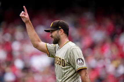 San Diego Padres starting pitcher Michael Wacha (52) gestures toward San Diego Padres center fielder Trent Grisham (1) after completing a catch in the second inning during a baseball game between the San Diego Padres and the Cincinnati Reds, Saturday, July 1, 2023, at Great American Ball Park in Cincinnati.