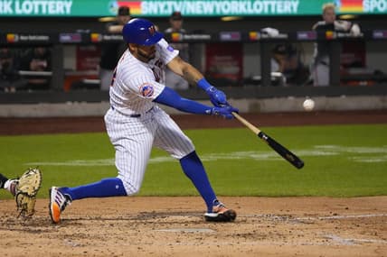Jul 2, 2023; New York City, New York, USA; New York Mets left fielder Tommy Pham (28) hits an RBI double against the San Francisco Giants during the fourth inning at Citi Field. Mandatory Credit: Gregory Fisher-USA TODAY Sports