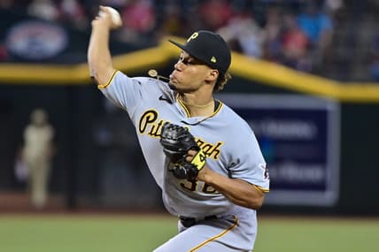 Jul 7, 2023; Phoenix, Arizona, USA; Pittsburgh Pirates relief pitcher Dauri Moreta (36) throws in the eighth inning against the Arizona Diamondbacks  at Chase Field. Mandatory Credit: Matt Kartozian-USA TODAY Sports