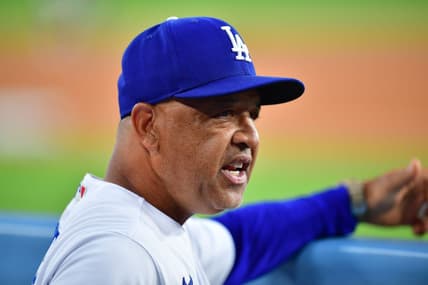Jul 24, 2023; Los Angeles, California, USA; Los Angeles Dodgers manager Dave Roberts (30) watches game action against the Toronto Blue Jays during the fourth inning at Dodger Stadium. Mandatory Credit: Gary A. Vasquez-USA TODAY Sports