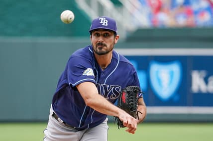 Jul 16, 2023; Kansas City, Missouri, USA; Tampa Bay Rays starting pitcher Zach Eflin (24) delivers a pitch against the Kansas City Royals prior to a game at Kauffman Stadium. Mandatory Credit: Denny Medley-USA TODAY Sports
