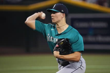 Jul 29, 2023; Phoenix, Arizona, USA; Seattle Mariners starting pitcher Bryan Woo (33) pitches against the Arizona Diamondbacks during the first inning at Chase Field. Mandatory Credit: Joe Camporeale-USA TODAY Sports