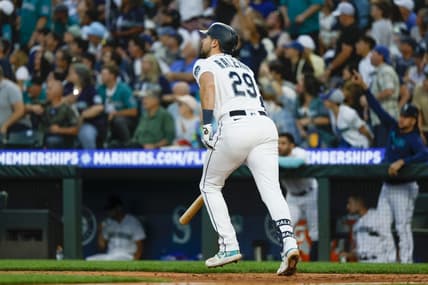 Jul 31, 2023; Seattle, Washington, USA; Seattle Mariners catcher Cal Raleigh (29) hits a solo home run against the Boston Red Sox during the seventh inning at T-Mobile Park. Mandatory Credit: Joe Nicholson-USA TODAY Sports