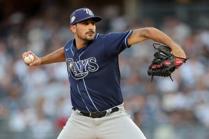 Aug 1, 2023; Bronx, New York, USA; Tampa Bay Rays starting pitcher Zach Eflin (24) pitches against the New York Yankees during the first inning at Yankee Stadium. Mandatory Credit: Brad Penner-USA TODAY Sports