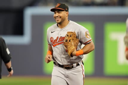 Aug 1, 2023; Toronto, Ontario, CAN; Baltimore Orioles right fielder Anthony Santander (25) reacts as he comes off the field after making a fly ball catch on Toronto Blue Jays shortstop Santiago Espinal (not pictured) during the seventh inning at Rogers Centre. Mandatory Credit: John E. Sokolowski-USA TODAY Sports