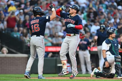 Aug 1, 2023; Seattle, Washington, USA; Boston Red Sox center fielder Jarren Duran (16) and designated hitter Alex Verdugo (99) celebrate after Verdugo hit a two run home run against the Seattle Mariners during the fifth inning at T-Mobile Park. Mandatory Credit: Steven Bisig-USA TODAY Sports