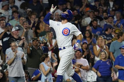 Aug 1, 2023; Chicago, Illinois, USA; Chicago Cubs shortstop Dansby Swanson (7) gestures after hitting a two-run homer against the Cincinnati Reds during the fourth inning at Wrigley Field. Mandatory Credit: David Banks-USA TODAY Sports