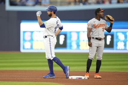 Aug 2, 2023; Toronto, Ontario, CAN; Toronto Blue Jays first baseman Brandon Belt (13) gestures to his dugout after hitting a double against the Baltimore Orioles during the fourth inning at Rogers Centre. Mandatory Credit: John E. Sokolowski-USA TODAY Sports
