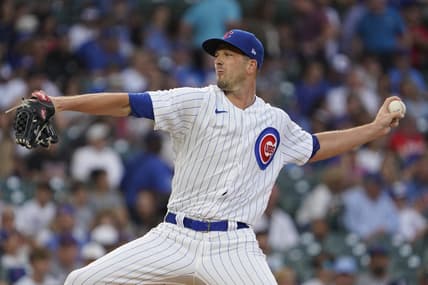 Aug 2, 2023; Chicago, Illinois, USA; Chicago Cubs starting pitcher Drew Smyly (11) throws the ball against the Cincinnati Reds during the first inning at Wrigley Field. Mandatory Credit: David Banks-USA TODAY Sports