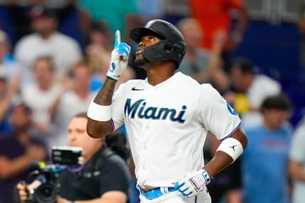 Aug 2, 2023; Miami, Florida, USA; Miami Marlins designated hitter Jorge Soler (12) celebrates hitting a home run against the Philadelphia Phillies during the ninth inning at loanDepot Park. Mandatory Credit: Rich Storry-USA TODAY Sports