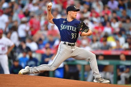 August 3, 2023; Anaheim, California, USA; Seattle Mariners starting pitcher Bryan Woo (33) throws against the Los Angeles Angels during the first inning at Angel Stadium. Mandatory Credit: Gary A. Vasquez-USA TODAY Sports