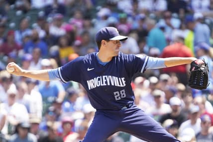 Aug 4, 2023; Chicago, Illinois, USA; Chicago Cubs starting pitcher Kyle Hendricks (28) throws the ball against the Atlanta Braves during the first inning at Wrigley Field. Mandatory Credit: David Banks-USA TODAY Sports
