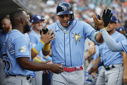 Aug 4, 2023; Detroit, Michigan, USA;  Tampa Bay Rays center fielder Jose Siri (22) is greeted after he hits a two run home run in the second inning against the Detroit Tigers at Comerica Park. Mandatory Credit: Rick Osentoski-USA TODAY Sports
