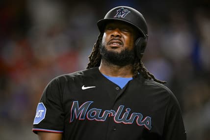 Aug 4, 2023; Arlington, Texas, USA; Miami Marlins designated hitter Josh Bell (9) reacts to striking out against the Texas Rangers during the sixth inning at Globe Life Field. Mandatory Credit: Jerome Miron-USA TODAY Sports