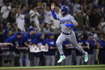Aug 4, 2023; San Diego, California, USA; Los Angeles Dodgers left fielder Enrique Hernandez (8) scores a run against the San Diego Padres during the eighth inning at Petco Park. Mandatory Credit: Orlando Ramirez-USA TODAY Sports